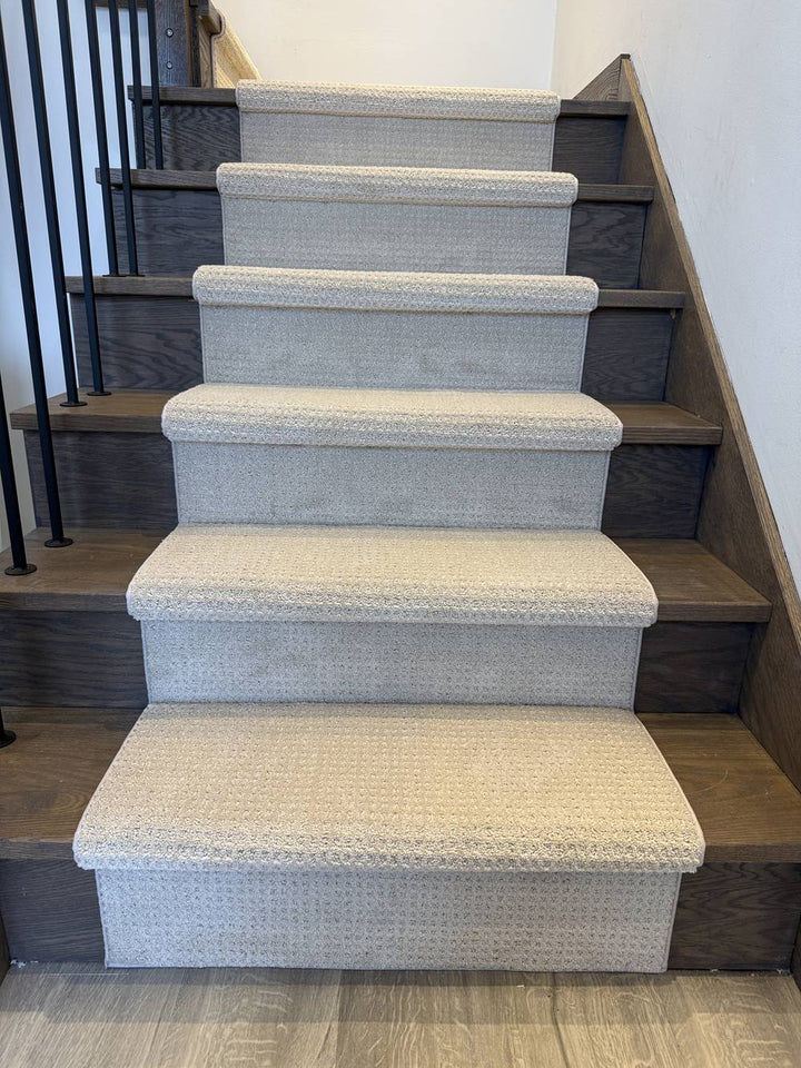 Garibaldi Estate Democracy stair runner carpet on dark hardwood stairs with white walls
