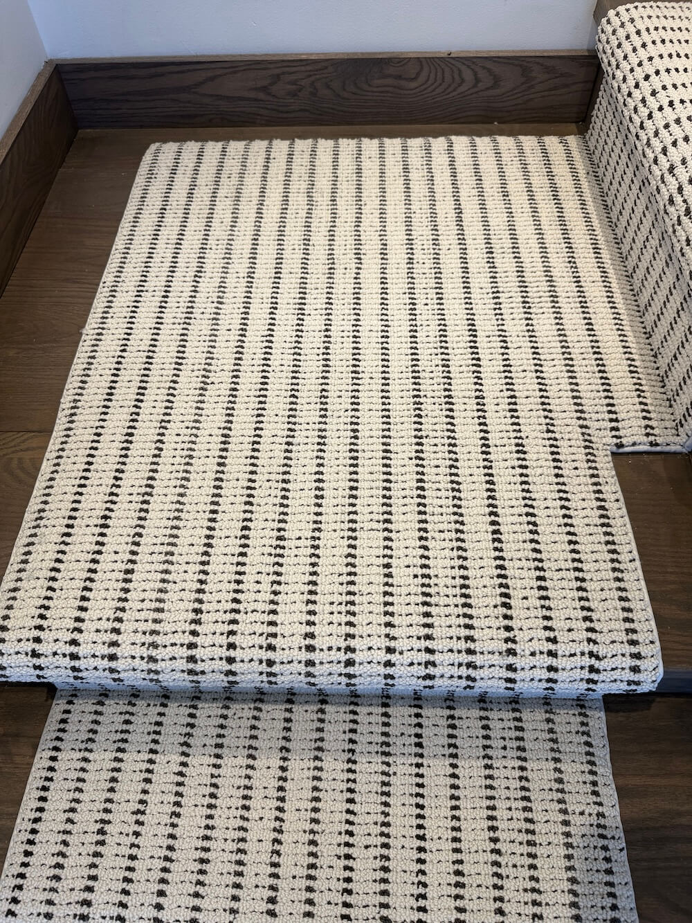 Anderson Tuftex Laken Checkers stair runner landing