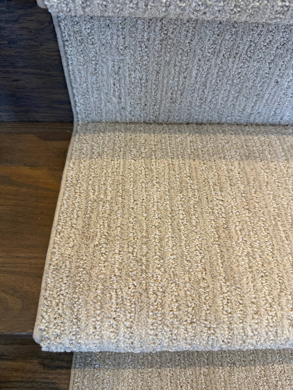 Close-up of modern beige stair runner linear texture