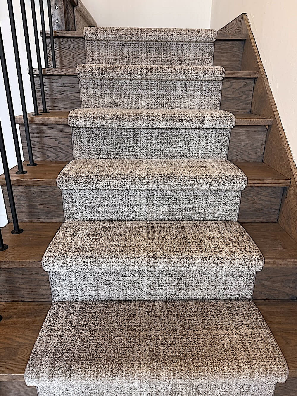 Grey stair runner on modern stairs