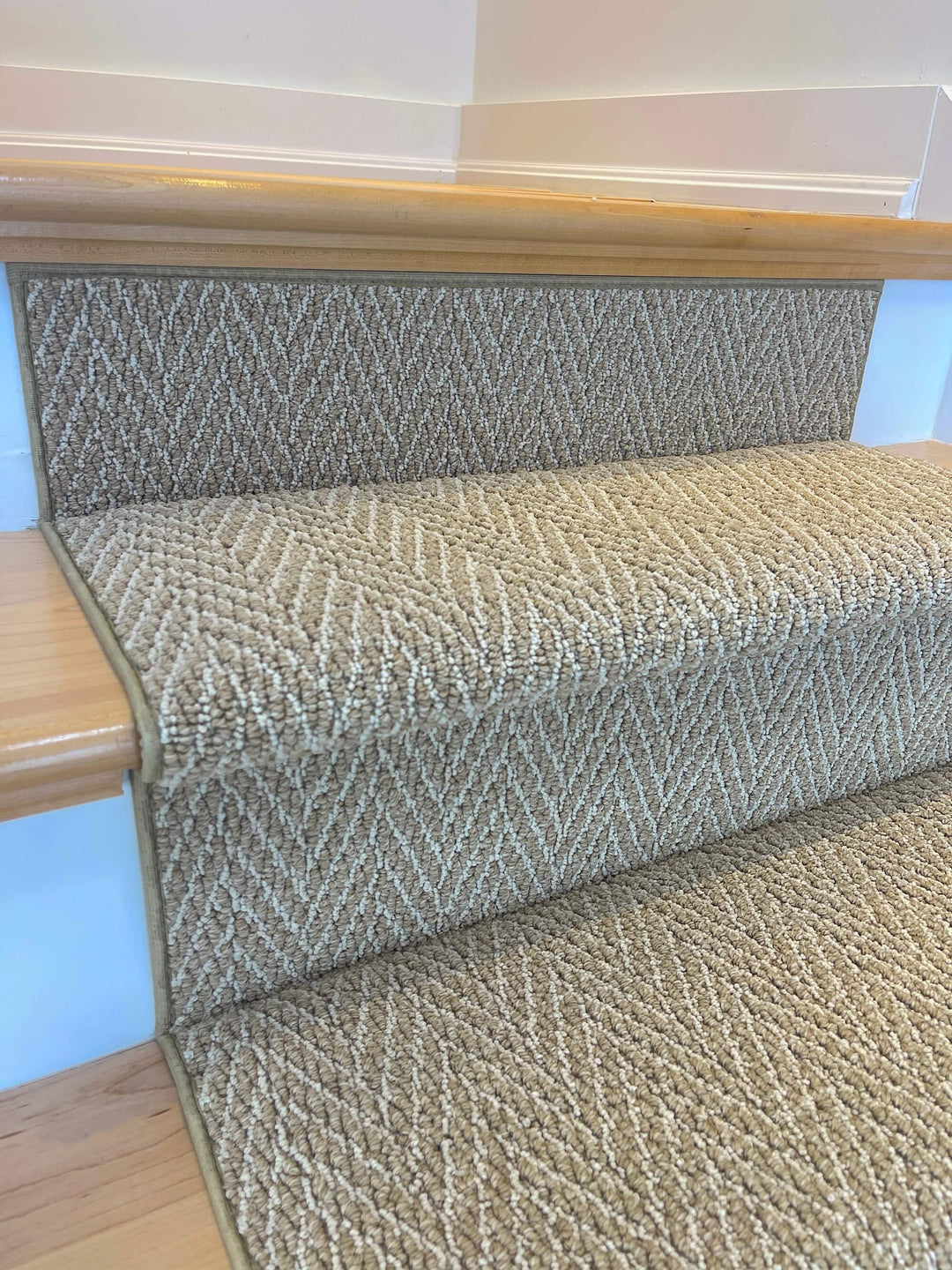 left side view of gold herringbone runner with landing