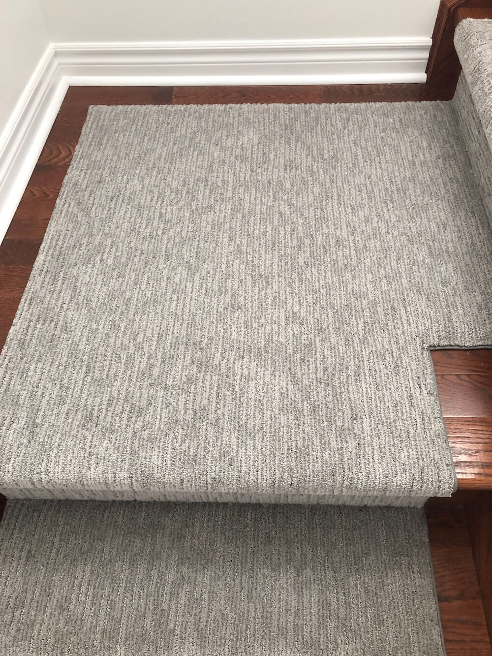 Modern stair runner landing in grey